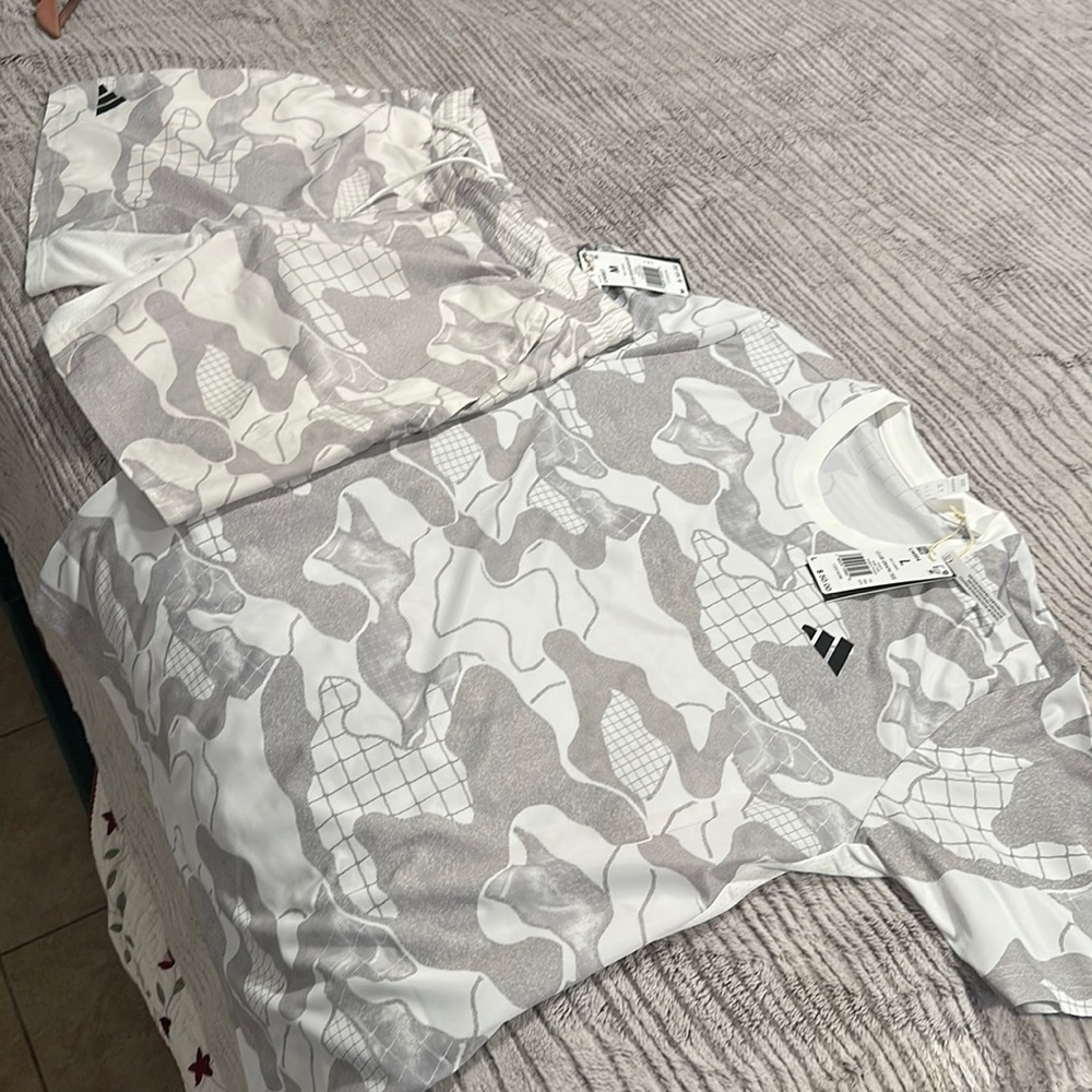 Original Adidas  tennis the shirt is a size large and the shorts are size medium